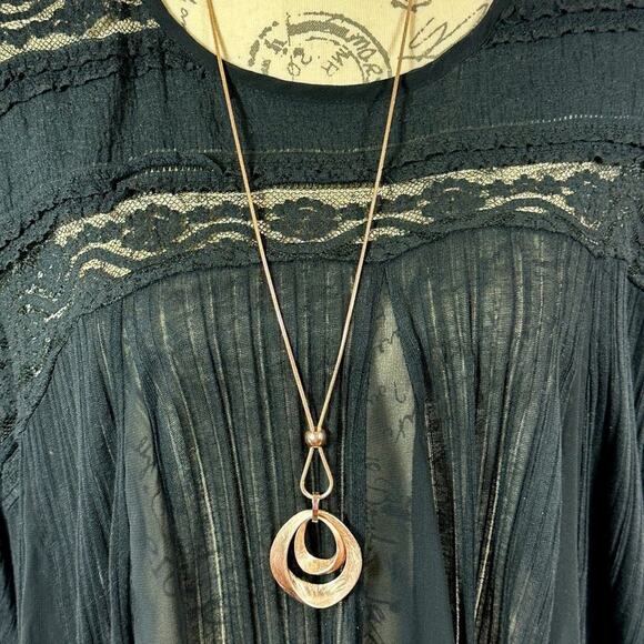 Gold Waterdrop Brushed Pendant on a Gold Rope Chain - Picture 4 of 13